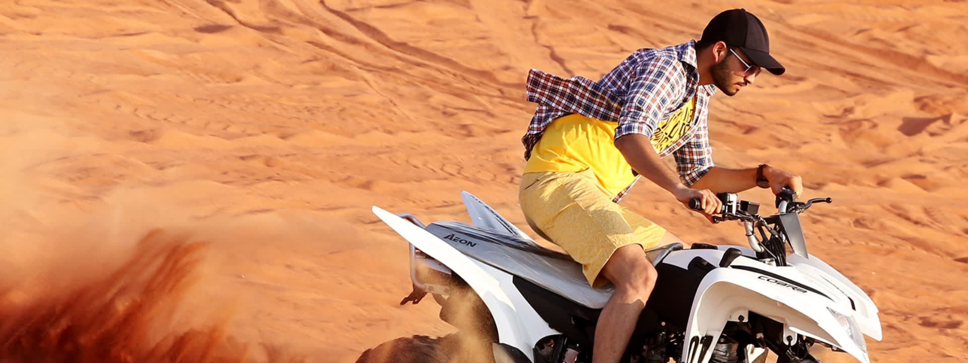 Red Dunes by Quad Bike, Camel Ride and Sandboarding with BBQ Dinner