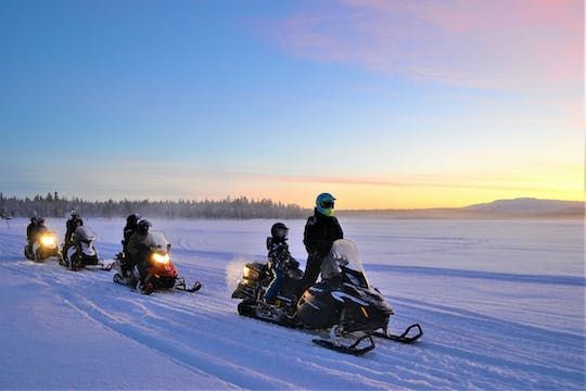 Traditional snowmobile safari in Levi to reindeer farm