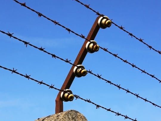 Dachau concentration camp memorial tour with transfer from Munich