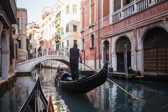 Guided walking tour and grand canal gondola ride in Venice