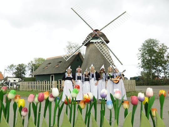 Picture in Volendam costume with cheese and clog tour
