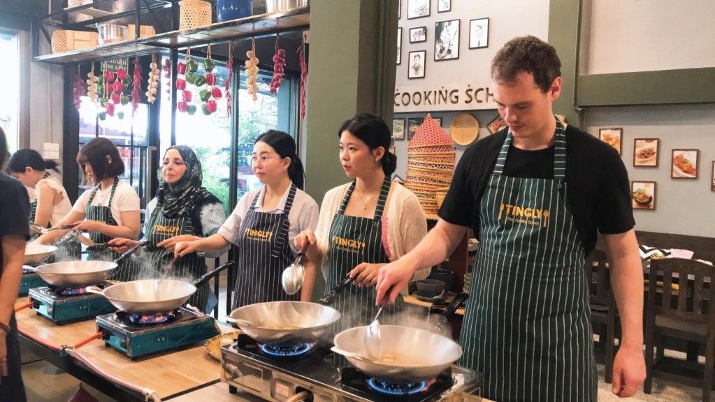 Experience Thai cooking class at Tingly Thai Cooking School