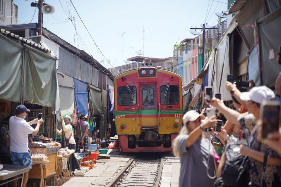 Classic Bangkok tour - Railway Train market & Damnoen Saduak Floating market