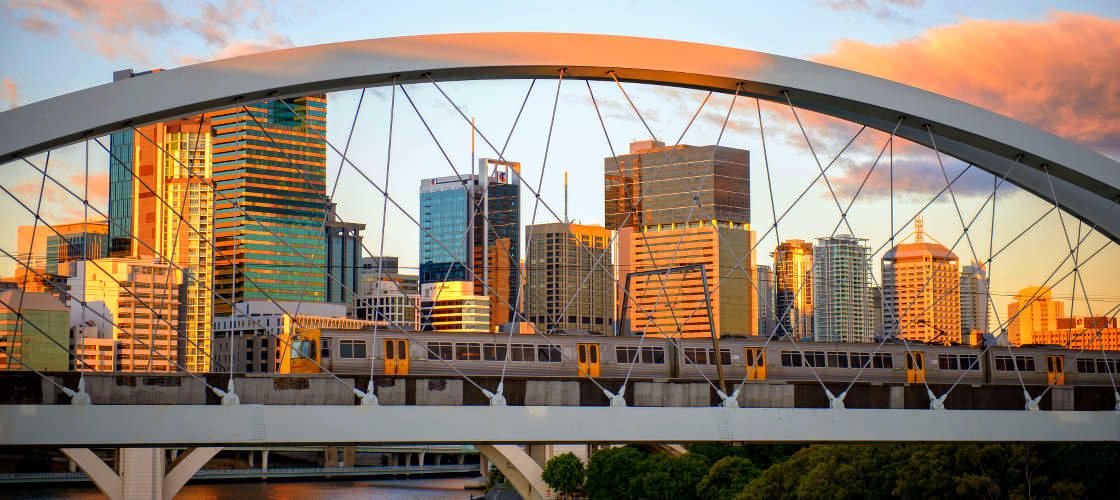 Brisbane Airport to Gold Coast Hotels Train and Chauffeured Vehicle Package